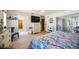 Spacious main bedroom with ample light and a dresser at 9273 Carnation Ave, Englewood, FL 34224