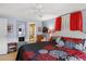 Main bedroom with ensuite bathroom access and ceiling fan at 130 Nautical Dr, North Port, FL 34287