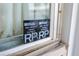 Close-up of window sticker indicating mobile home real property at 130 Nautical Dr, North Port, FL 34287