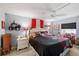 Main bedroom with a comfortable bed and plenty of natural light at 130 Nautical Dr, North Port, FL 34287