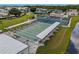 Expansive shuffleboard courts next to tennis courts at 130 Nautical Dr, North Port, FL 34287
