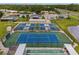 Aerial view of tennis, pickleball and shuffleboard courts at 130 Nautical Dr, North Port, FL 34287
