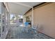 Enjoy the view from this screened-in porch with seating for two at 130 Nautical Dr, North Port, FL 34287