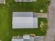 Overhead view of a single mobile home and its yard at 130 Nautical Dr, North Port, FL 34287