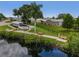 Relaxing waterfront pavilion with benches and picnic tables at 130 Nautical Dr, North Port, FL 34287