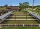 Community shuffleboard courts with covered seating at 130 Nautical Dr, North Port, FL 34287