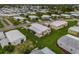 Mobile home with carport in a 55+ community at 130 Nautical Dr, North Port, FL 34287