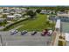 Community features a large green space, tennis courts, and ample parking at 130 Nautical Dr, North Port, FL 34287