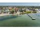 Aerial view showcasing the property's proximity to a waterfront and neighborhood at 470 S Mccall Rd # 10, Englewood, FL 34223