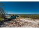 Outdoor area with a fire pit, kayaks, and waterfront views at 470 S Mccall Rd # 10, Englewood, FL 34223