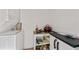 Laundry room area with washer, dryer, utility sink, and shelving at 470 S Mccall Rd # 10, Englewood, FL 34223