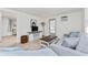 Cozy living room with comfortable seating, stylish furniture, and light wood flooring at 470 S Mccall Rd # 10, Englewood, FL 34223