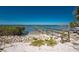 Waterfront property featuring a dock and natural shoreline at 470 S Mccall Rd # 10, Englewood, FL 34223