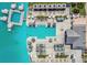 Amazing overhead view of community pool and lagoon with lounging spots and outdoor entertaining at 7537 Pool Compass Loop, Wesley Chapel, FL 33545