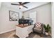 Functional office space featuring a work desk and comfortable seating at 7537 Pool Compass Loop, Wesley Chapel, FL 33545