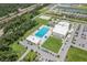 Aerial view of community pool and recreation center at 1352 Sunset Preserve Way, Port Charlotte, FL 33953