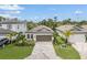 Attractive single-story home with a paved driveway and landscaped front yard at 1352 Sunset Preserve Way, Port Charlotte, FL 33953