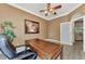 Bright home office with hardwood floors and built-in desk at 3533 Pennyroyal Rd, Port Charlotte, FL 33953