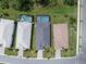Aerial view showcasing a house with a pool and yard in a neighborhood at 9982 Beachwalk Dr, Englewood, FL 34223