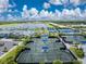 Beachwalk tennis courts with shade structures at 9982 Beachwalk Dr, Englewood, FL 34223