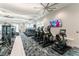 Modern fitness center with treadmills and other cardio equipment at 9982 Beachwalk Dr, Englewood, FL 34223
