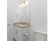 Simple bathroom with a single vanity and toilet at 9982 Beachwalk Dr, Englewood, FL 34223