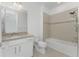 Clean bathroom with tub and shower combo at 9982 Beachwalk Dr, Englewood, FL 34223
