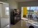 Living room with balcony and water views at 2140 Heron Lake Dr # 306, Punta Gorda, FL 33983