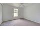 Spacious bedroom with carpeted floor and window at 1502 Hazelton Ave, North Port, FL 34286