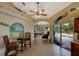Charming breakfast nook with a view of the pool and backyard at 229 Rotonda E Blvd, Rotonda West, FL 33947