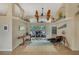 Bright and spacious living room with tiled floors and a large window at 229 Rotonda E Blvd, Rotonda West, FL 33947