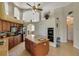 Spacious kitchen with island, double oven, and granite countertops at 229 Rotonda E Blvd, Rotonda West, FL 33947