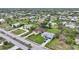 Wide aerial view of neighborhood with houses and streets at 229 Rotonda E Blvd, Rotonda West, FL 33947