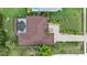 Aerial view of house with pool and landscaped yard at 229 Rotonda E Blvd, Rotonda West, FL 33947