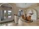 Casual dining area with a round table and wicker chairs at 229 Rotonda E Blvd, Rotonda West, FL 33947