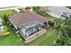 Aerial view showing house, pool, and surrounding landscape at 229 Rotonda E Blvd, Rotonda West, FL 33947