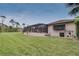 Large backyard with screened enclosure and pool at 229 Rotonda E Blvd, Rotonda West, FL 33947