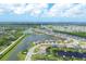 Expansive aerial view of waterfront community with lush landscape at 14589 Ponce De Leon Trl, Port Charlotte, FL 33981