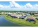 Aerial view of waterfront community with houses and lush landscaping at 14589 Ponce De Leon Trl, Port Charlotte, FL 33981