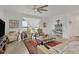 Living room features water views, comfortable seating, and a stylish rug at 14589 Ponce De Leon Trl, Port Charlotte, FL 33981