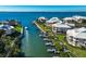 Stunning aerial view showcasing waterfront homes with private docks and tranquil canal access at 11000 Placida Rd # 2203, Placida, FL 33946