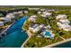 Community pool and canal views from above at 11000 Placida Rd # 2303, Placida, FL 33946
