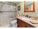 Updated bathroom with a tiled glass shower and granite vanity at 11000 Placida Rd # 2303, Placida, FL 33946