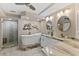 Luxurious bathroom with a modern freestanding tub, stone shower, and elegant vanity at 11000 Placida Rd # 2303, Placida, FL 33946