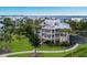 Charming multi-story home with lush landscaping, screened balconies and a metal roof near the water at 11000 Placida Rd # 2303, Placida, FL 33946