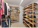 Organized walk-in closet with ample shelving and hanging space at 11000 Placida Rd # 2303, Placida, FL 33946