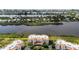 Aerial view of condo community near waterway at 11160 Hacienda Del Mar Blvd # D-205, Placida, FL 33946