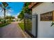 Community entrance to Hacienda Del Mar Boulevard with lush landscaping at 11160 Hacienda Del Mar Blvd # D-205, Placida, FL 33946