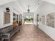 Hallway with natural light, bench, and mailboxes at 11160 Hacienda Del Mar Blvd # D-205, Placida, FL 33946