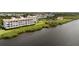 Beautiful waterfront condos offer stunning views of the bay, manicured lawns and lush mangrove shoreline at 11160 Hacienda Del Mar Blvd # D-205, Placida, FL 33946